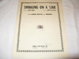 Download or print Johnny Burke Swinging On A Star Sheet Music Printable PDF 4-page score for Easy Listening / arranged Piano, Vocal & Guitar (Right-Hand Melody) SKU: 40375