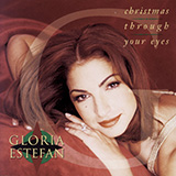 Download or print Gloria Estefan Christmas Through Your Eyes Sheet Music Printable PDF 4-page score for Latin / arranged Piano, Vocal & Guitar (Right-Hand Melody) SKU: 473549
