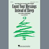 Download or print Irving Berlin Count Your Blessings Instead Of Sheep (from White Christmas) (arr. Kirby Shaw) Sheet Music Printable PDF 3-page score for Standards / arranged SATB Choir SKU: 453295