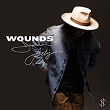 Download or print Jordan Feliz Wounds Sheet Music Printable PDF 8-page score for Pop / arranged Piano, Vocal & Guitar (Right-Hand Melody) SKU: 469536