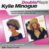 Download or print Kylie Minogue Wouldn't Change A Thing Sheet Music Printable PDF 4-page score for Pop / arranged Piano, Vocal & Guitar SKU: 47870